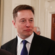 Illustration for article titled Heres Elon Musk Giving Donald Trump a Stern Talking to About the Muslim Ban